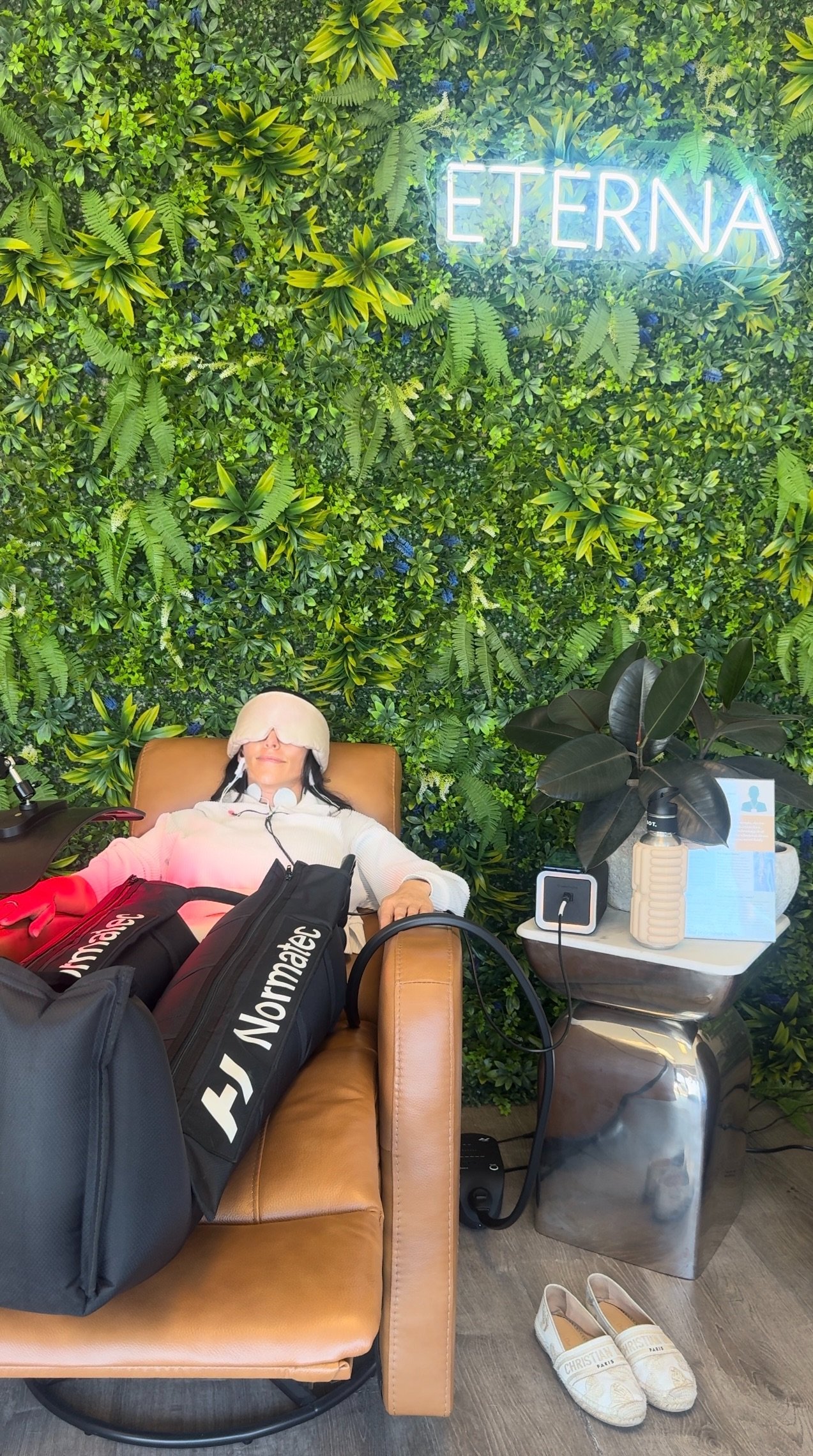 ETERNA HAUS clients relaxing in sequential pneumatic compression boots